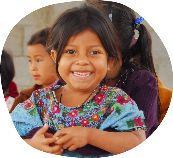 Guatemalan little girl being held 