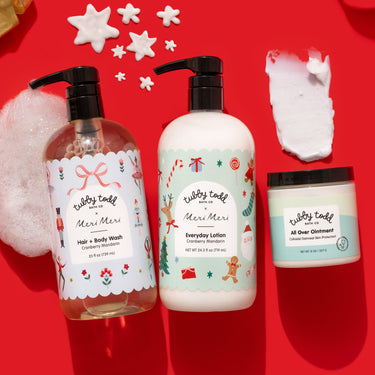 The Cranberry Mandarin Regulars products on a red background with star-shaped soap bubbles.