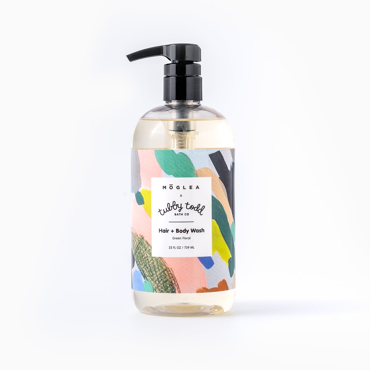 25oz Green Floral Hair + Body wash against white background
